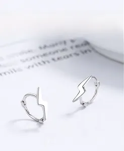 Macro shot of S925 sterling silver lightning bolt hoop earrings with thick plating