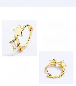 Macro view of S925 sterling silver star earring with sparkling cubic zirconia stone