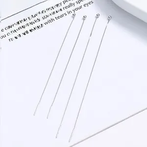 Detailed view of 925 sterling silver tassel threader earrings with mini round beads