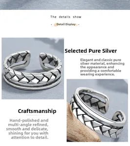 Detailed close-up of double-layered S925 sterling silver ring with vintage braided texture