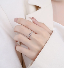 Detail of 925 sterling silver ring featuring double hearts with sparkling zircon pavé