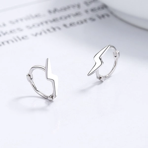 Polished S925 sterling silver lightning bolt hoop earrings with a minimalist sleek design