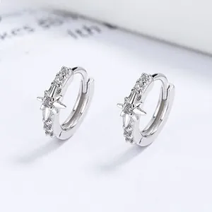 Close-up of S925 sterling silver star hoop earrings with sparkling zircon stones