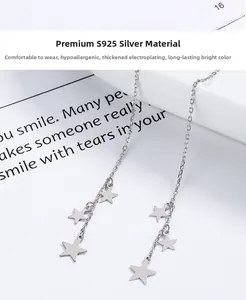 Detailed view of S925 sterling silver star tassel earrings with multiple star charms