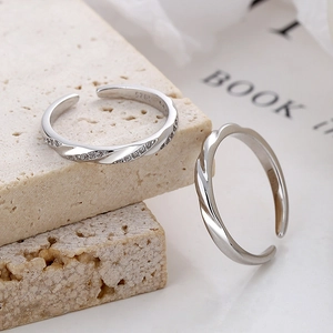 Minimalist S925 sterling silver Mobius couple rings with adjustable open band design