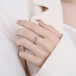 Elegant 925 silver heart ring with sparkling zircons worn on hand for women