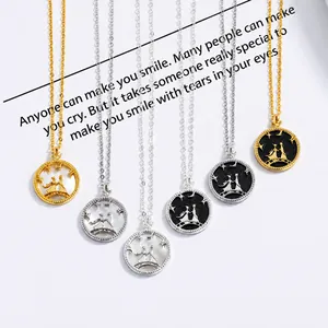 Macro view of sterling silver Little Prince and rose pendants in gold and silver