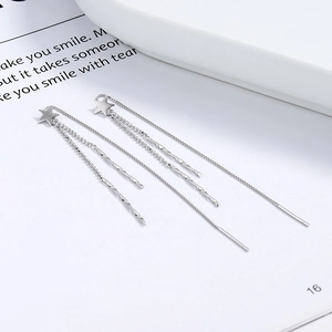 925 silver star tassel threader earrings with delicate chain on a white background