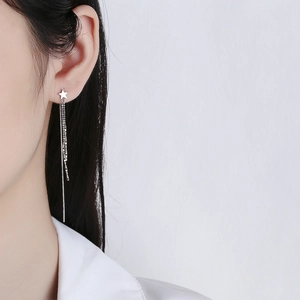 Elegant 925 sterling silver star tassel drop earrings shown on a model for a chic look