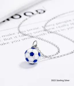 Detailed view of the 925 sterling silver soccer pendant with blue and white enamel texture
