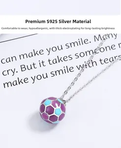 Detail of S925 silver football pendant with purple and blue enamel soccer ball design