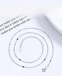 Detail of 925 sterling silver chain with small silver beads and S925 engraved stamp