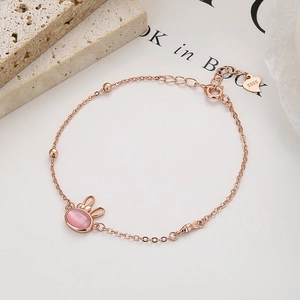 Rose gold 925 sterling silver bunny bracelet with pink cat eye stone and bead chain