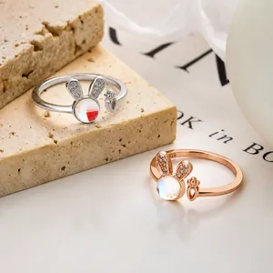 925 silver open ring featuring a moonstone rabbit and carrot design in silver and gold