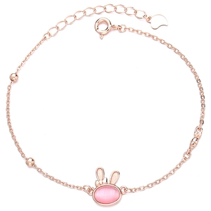 Rose gold 925 sterling silver bunny bracelet featuring a pink cat eye stone pendant