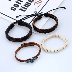 Men's vintage four-piece leather bracelet set with woven bands and metal cross charm