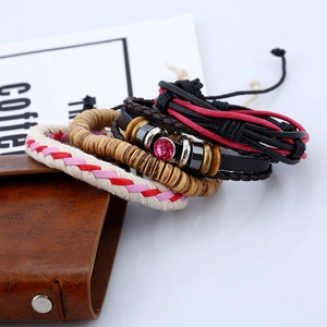Vintage woven leather bracelet set with wooden beads and red gemstone detail