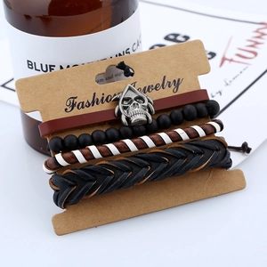 Set di 4 bracciali da uomo in vera pelle retrò con ciondoli a teschio e dettagli in perline