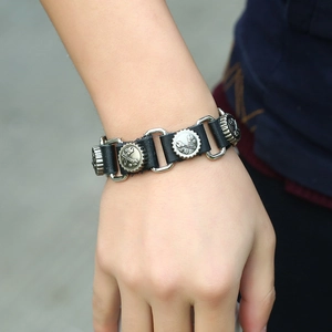 Men's punk leather bracelet with silver alloy rivets featuring tool relief carvings