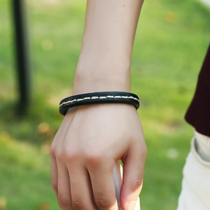 Men's retro black leather bracelet with white contrast stitching and magnetic clasp