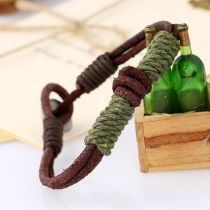 Retro handmade braided leather bracelet in dark brown and army green with loop closure