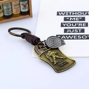 Porte-clés Verseau vintage en cuir tressé avec charmes en bronze et date gravée