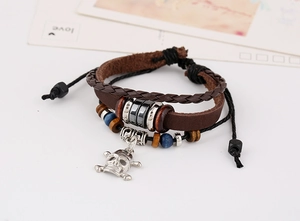 Detailed close-up of multilayer punk leather bracelet with alloy skull and wooden beads