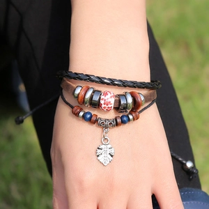 Retro multilayer leather beaded bracelet with wood beads and a metal leaf pendant