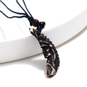 Vintage resin Indian chief head pendant necklace with black woven rope and wooden beads