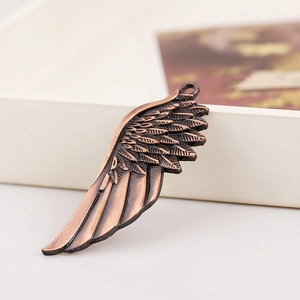 Retro bronze alloy wing pendant for DIY necklaces featuring detailed feather textures