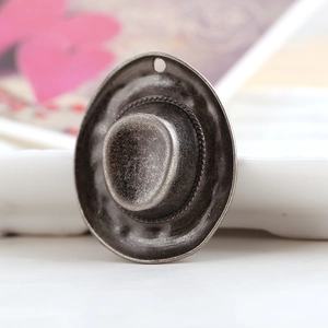 Vintage silver cowboy hat pendant for DIY jewelry making with rustic texture finish