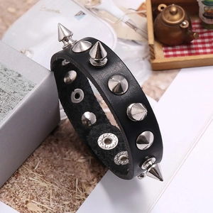 Punk black leather rivet bracelet with silver metal spikes and snap button closure