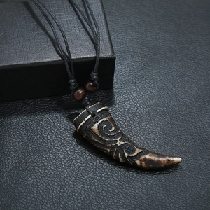 Tribal wolf tooth resin pendant necklace with carved patterns on black wax cord for men