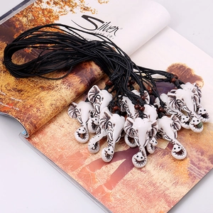 Retro elephant head pendant necklace set with ethnic resin carvings and black wax cords