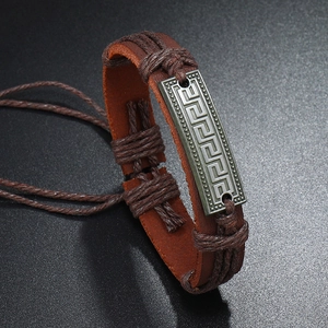 Handwoven retro brown leather bracelet for men featuring an adjustable bronze geometric charm
