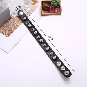 Punk black leather bracelet with 11 silver cone studs and adjustable snaps 22cm long