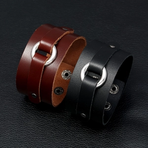 Vintage leather bracelets in black and brown with polished silver metal ring accents