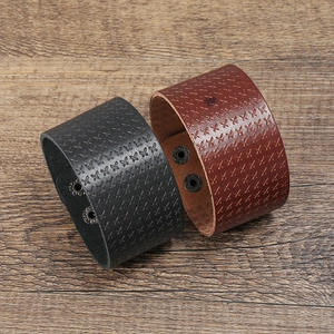 Vintage punk wide leather bracelet set in black and dark red with embossed X pattern