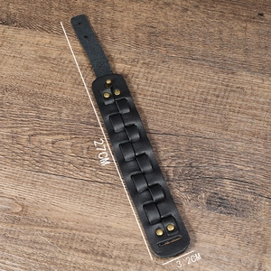 Detail view of a black punk leather wide bracelet showing 27cm length and 3.2cm width