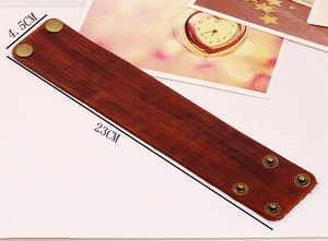 Detail view of brown vintage leather punk bracelet with dimensions 23cm by 4.5cm