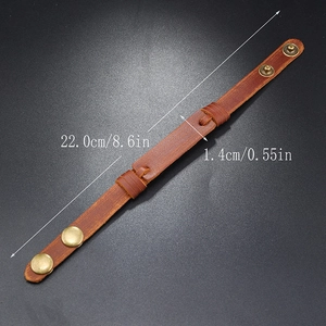 Detail view of multi-layer brown leather bracelet with dimensions of 22cm length and 1.4cm width