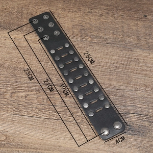 Punk style wide black leather bracelet with double row metal studs and snap buttons