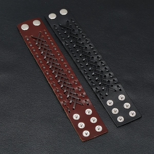Detailed view of woven leather bracelets featuring silver metal snap button fasteners