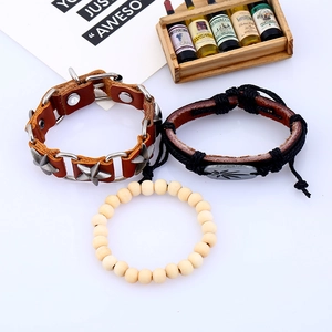 Three-piece retro leather bracelet set with pentagram studs, leaf charm and wood beads