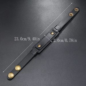 Detail view of black leather bracelet showing 23cm length and 2cm width dimensions