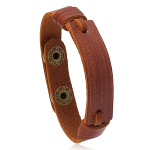 Retro brown multilayer leather bracelet with adjustable bronze metal snap buttons on white