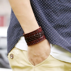 Retro woven dark brown leather wide bracelet for men with bohemian punk style on wrist