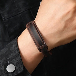 Retro dark brown wide leather bracelet for men with textured finish and vintage style