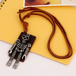 Vintage punk robot pendant necklace in aged silver metal on a brown leather cord