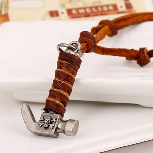 Vintage industrial alloy hammer pendant necklace with skull detail on brown leather cord